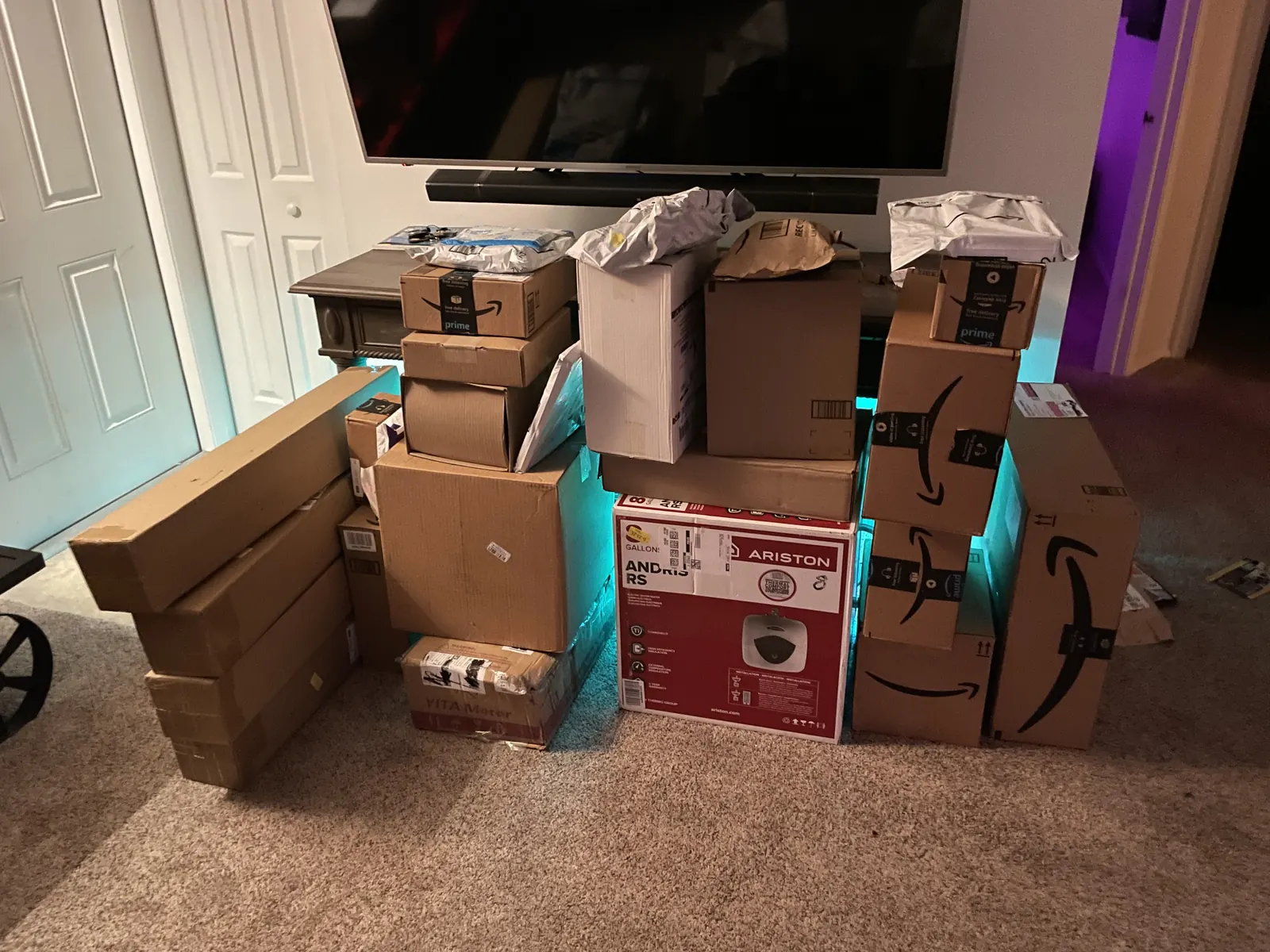 Cases of cocktail capsules stacked in the room