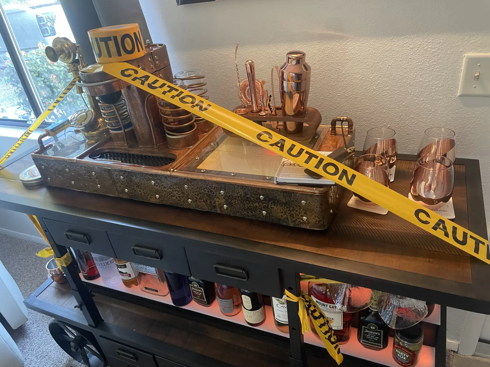 The machine draped in yellow caution tape during an upgrade
