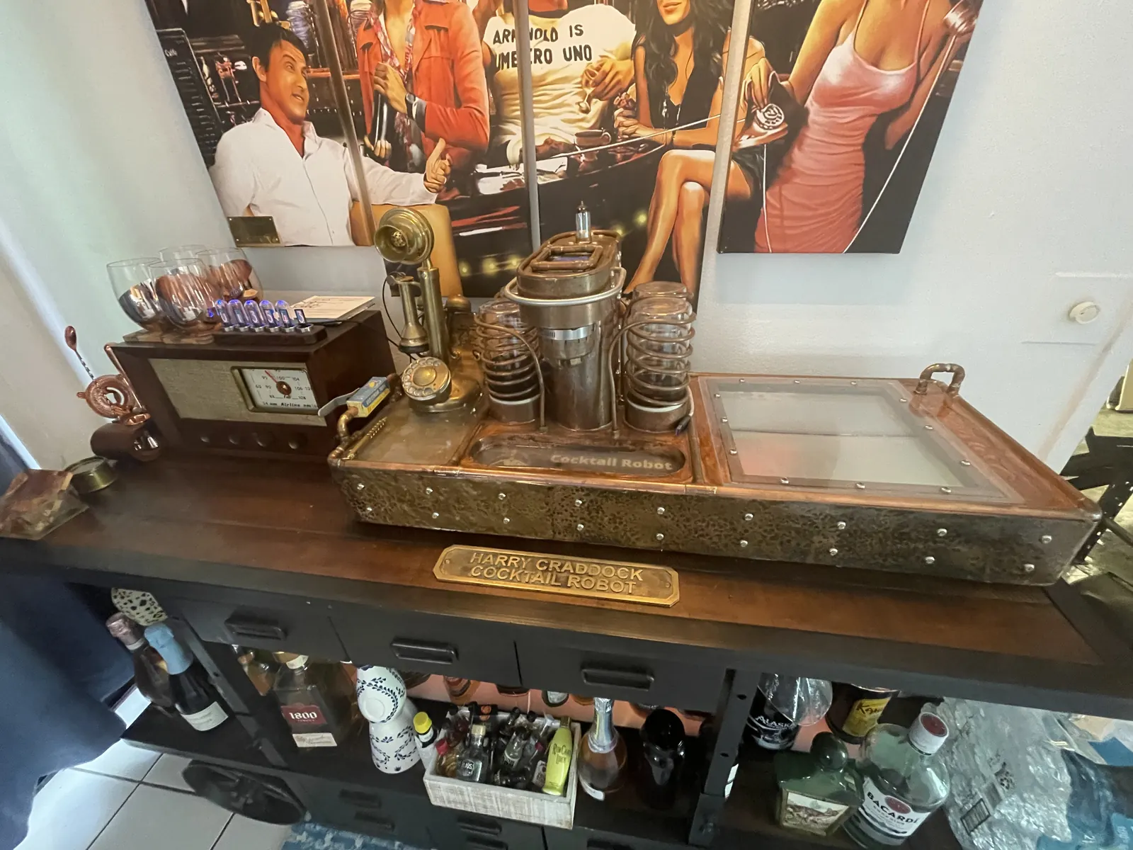 The machine at its post on the cart, bar stocked below