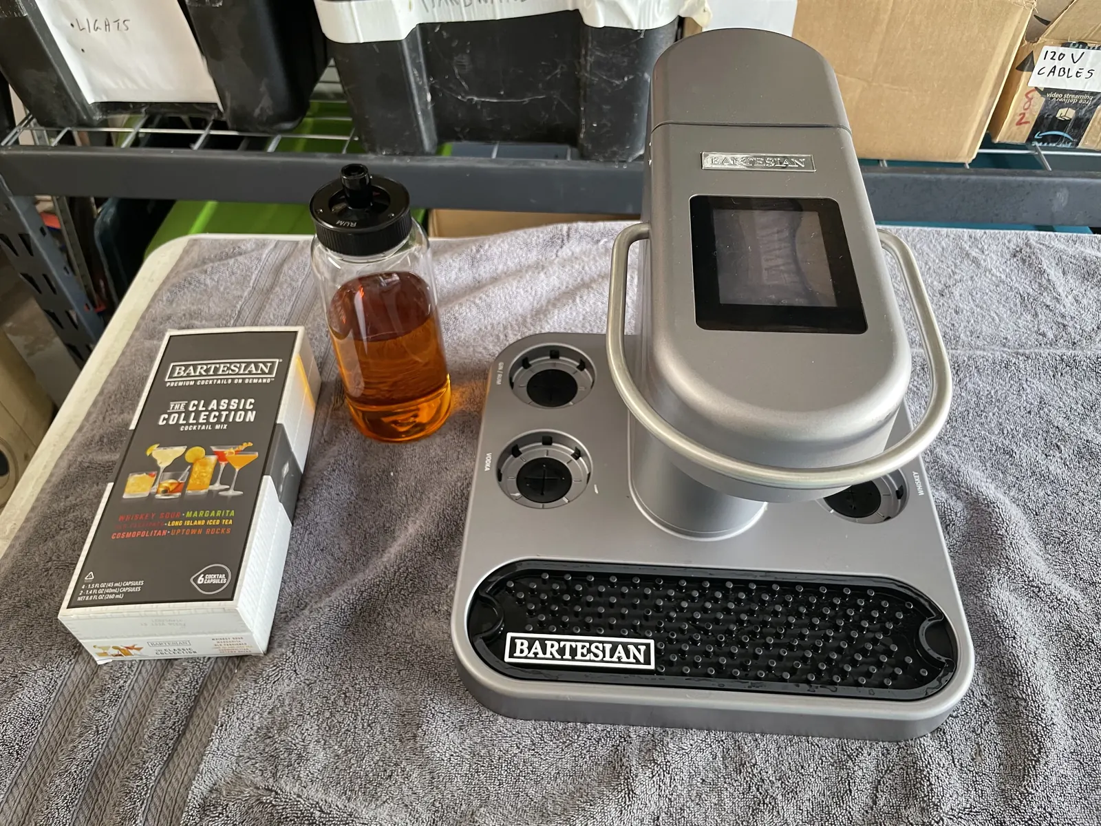 The Bartesian newly unboxed with its cocktail capsule boxes